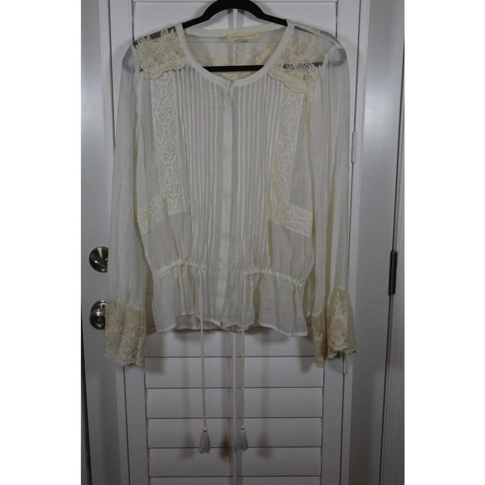 Love Stitch cream-colored sheer blouse with lace inserts and pintuck pleats